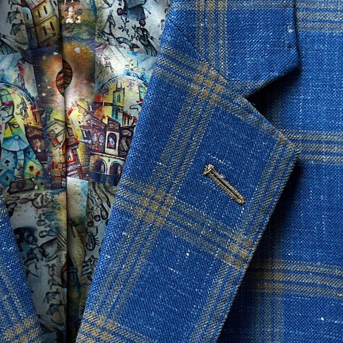 Notch lapel adding a traditional touch to a sky blue with tan windowpane men's sport coat.