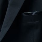 Pocket square accentuating the formal look of a classic black men's suit.