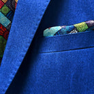 Pocket square accent on a light blue flannel suit for men.