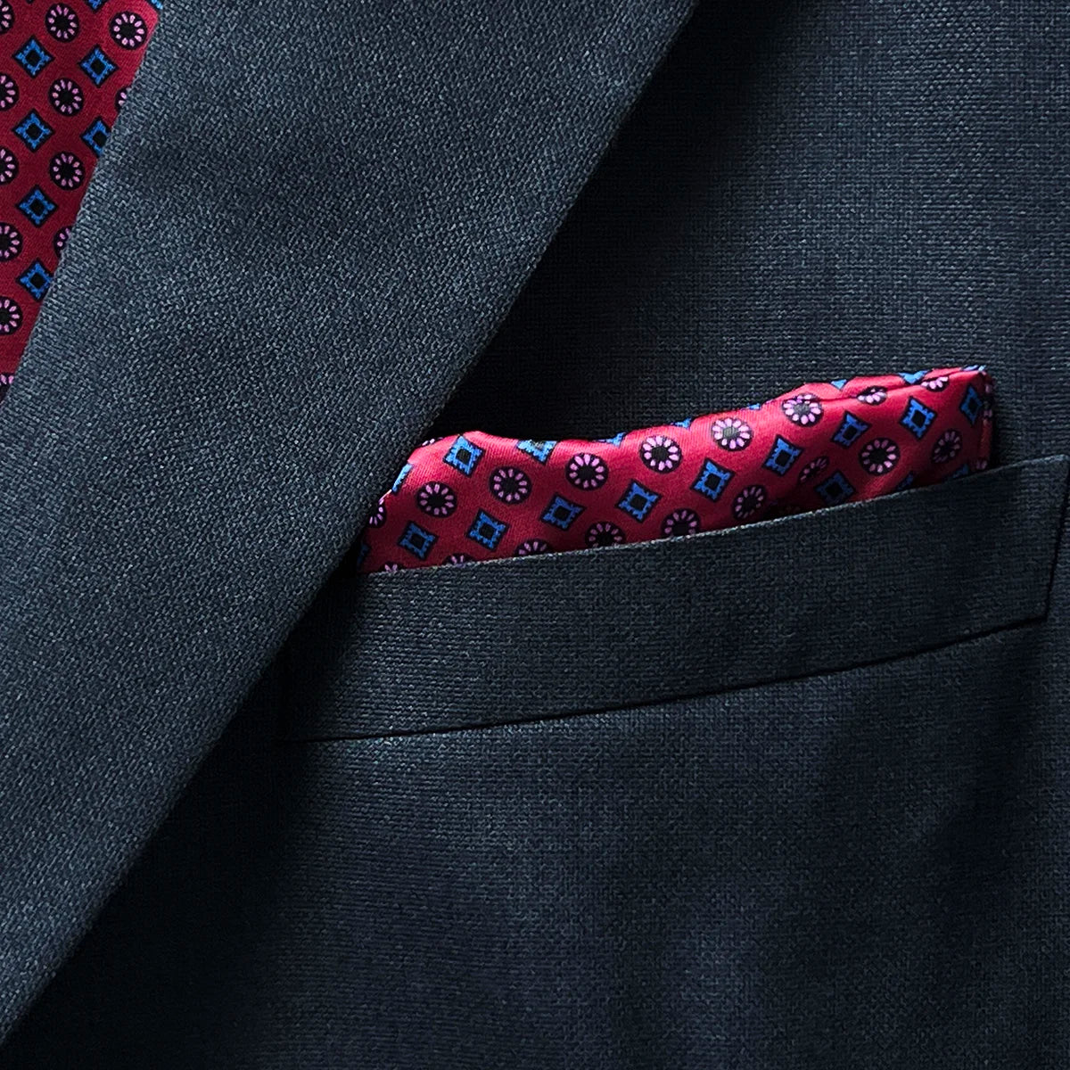 Pocket square in a charcoal grey suit jacket