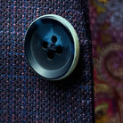 Macro detail of navy marble bone button texture and color