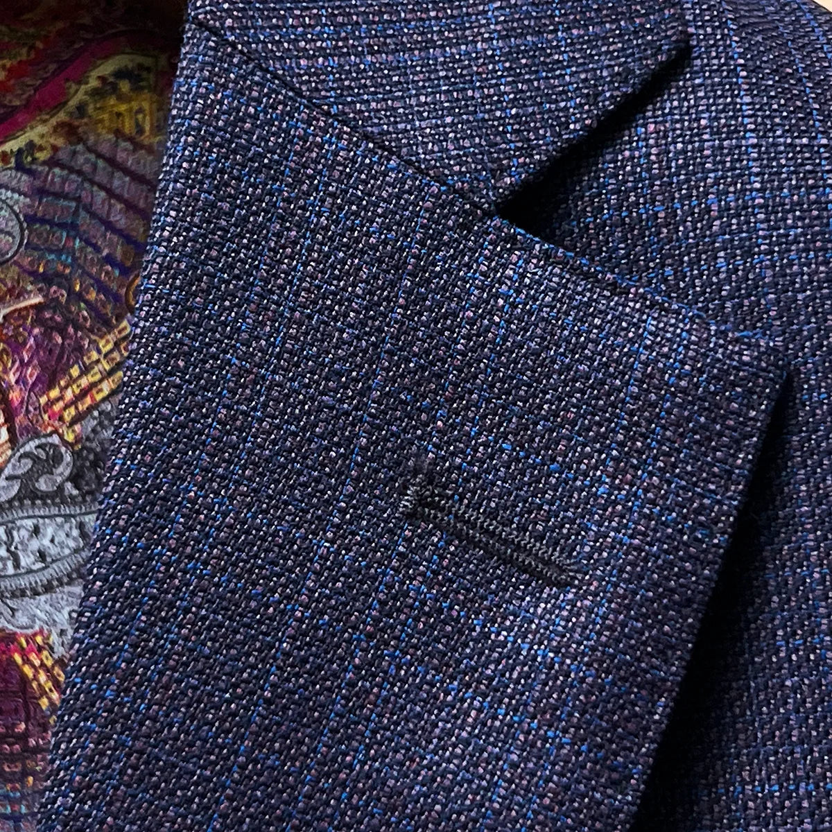 -up of notch lapel construction with pick stitching detail