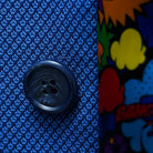 Close-up of the navy blue horn marble buttons on the sapphire blue men's suit, showcasing their elegant and polished finish.