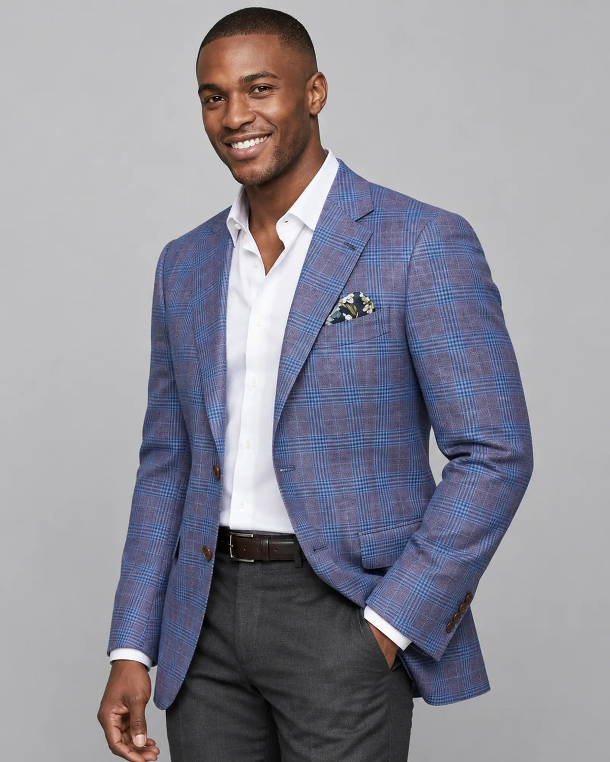 Side sportcoat model view of lilac mauve with cornflower blue Glen plaid men's sport coat showing the alternate side angle
