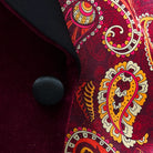 Elegant silk satin buttons on a burgundy velvet dinner jacket.