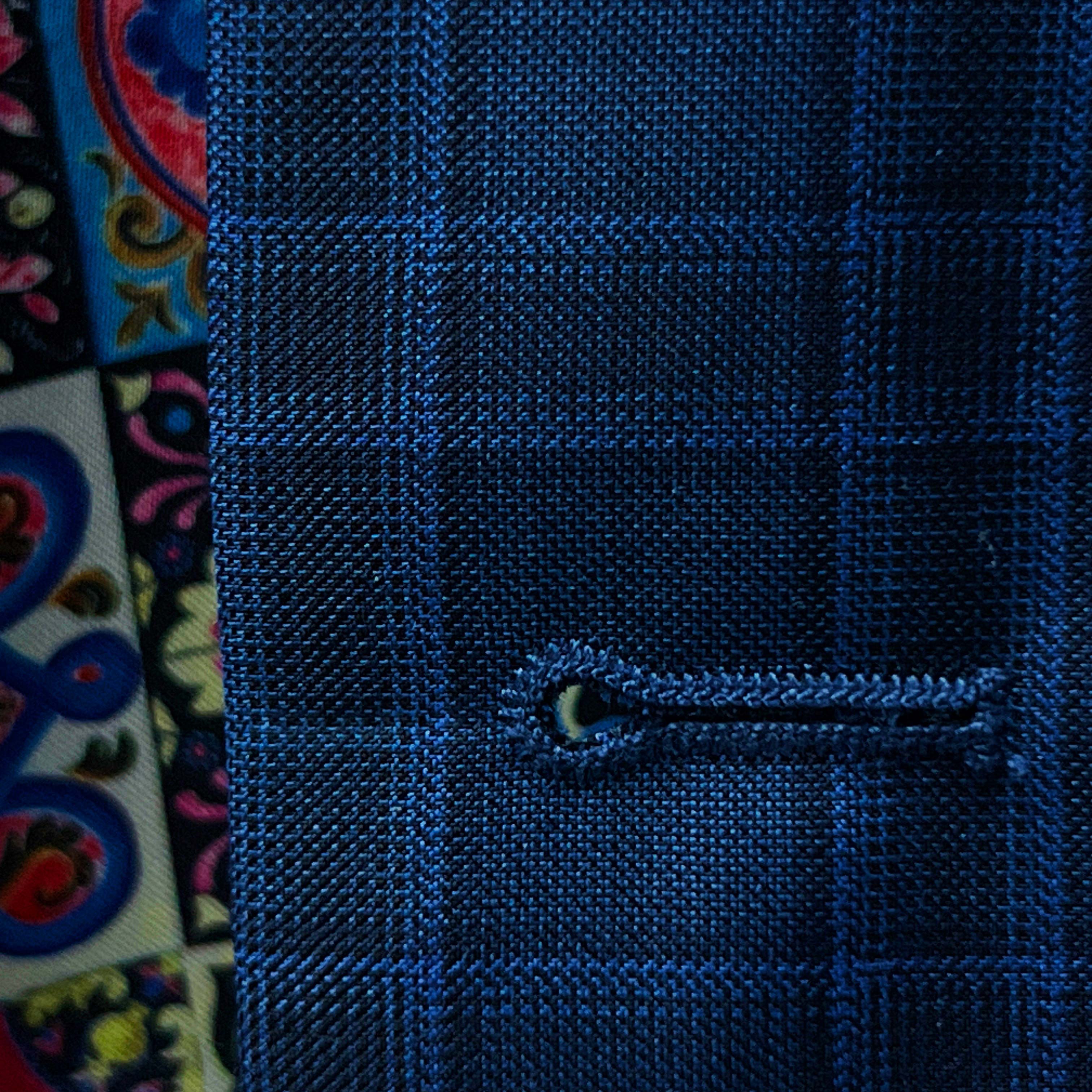 Men's custom tailored blazers in a stylish blue checkered pattern, made from high-quality Merino Wool.