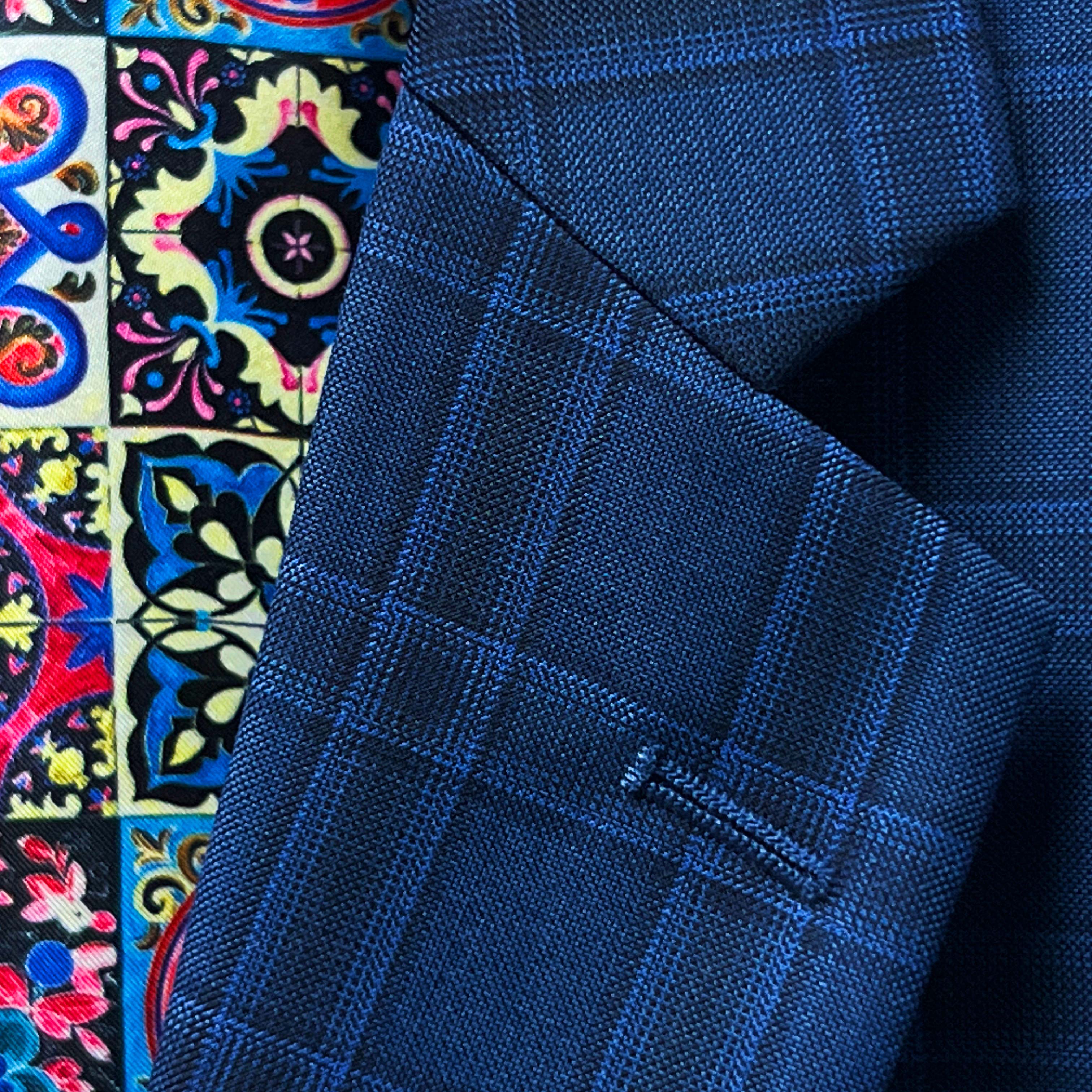 Tailored wedding suits in a unique blue checkered pattern, made from luxurious Merino Wool.