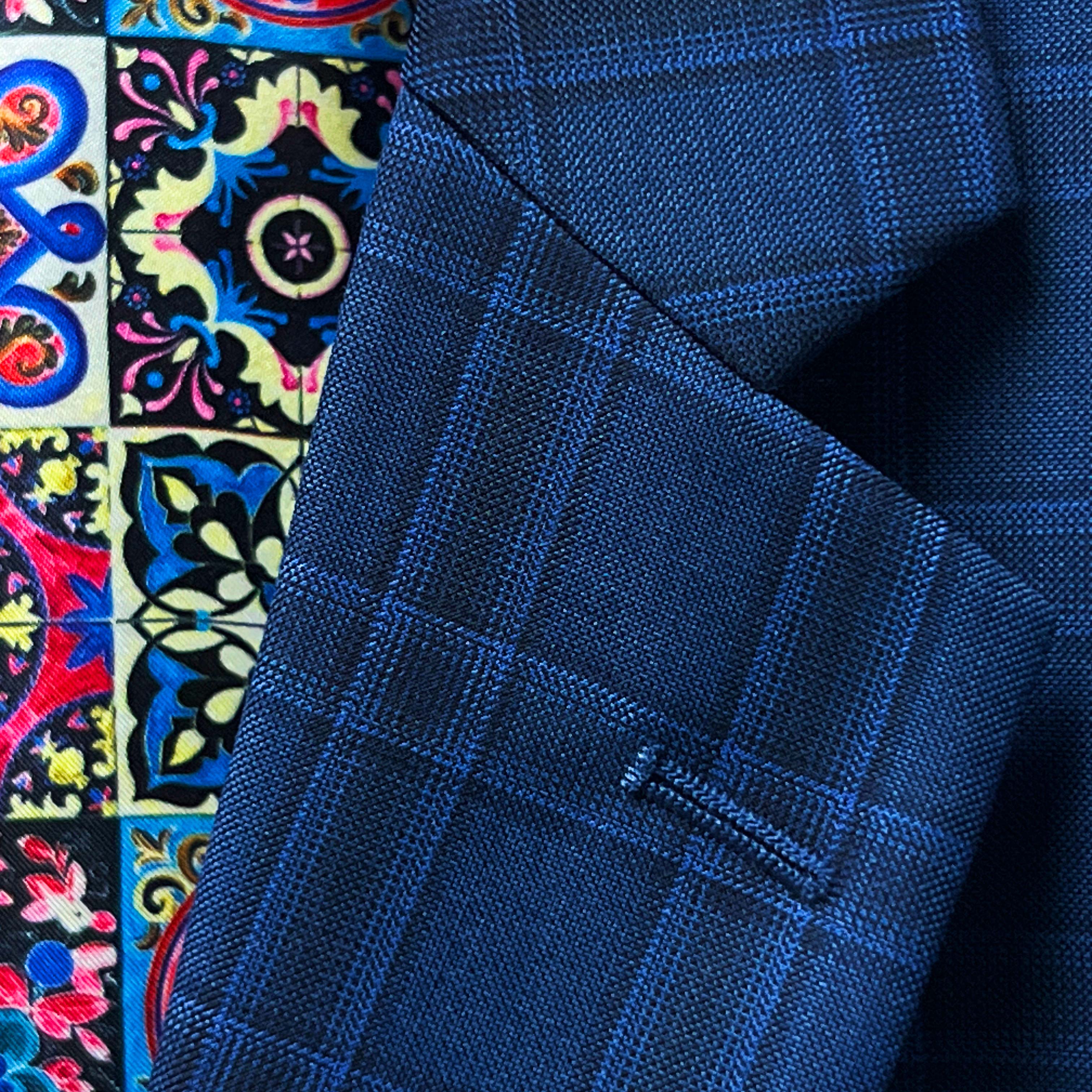 Tailored wedding suits in a unique blue checkered pattern, made from luxurious Merino Wool.