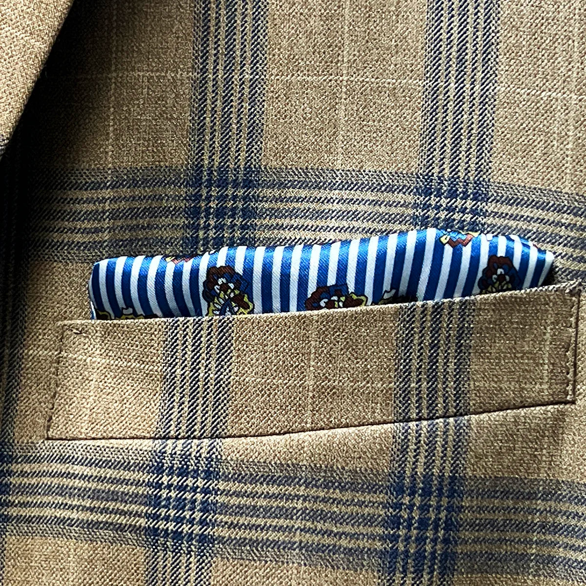 Detail of breast pocket with optional built-in pocket square feature