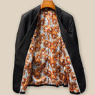 Full interior view of custom suit jacket showcasing luxurious sunflower floral fancy lining with Vitale Barberis Canonico branding