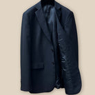 Interior view of the left side of a black Westwood Hart suit jacket, showcasing the black Bemberg silk lining