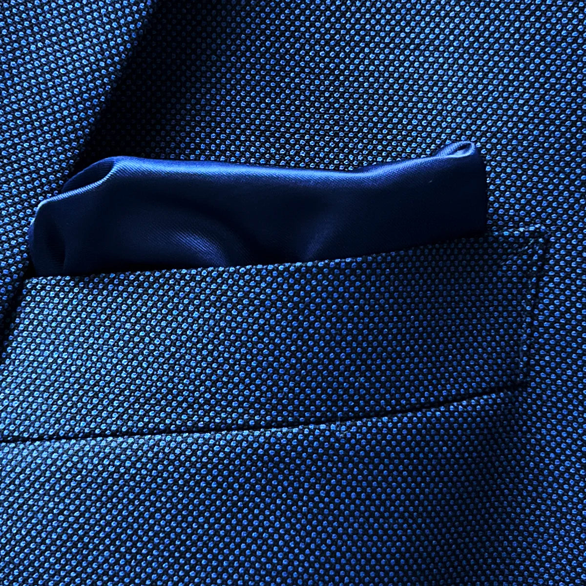 Detail of the breast pocket with optional built-in pocket square feature