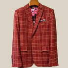 Close-up view of burgundy plaid sport coat showing contrast white accent buttonhole with hand-finished stitching detail