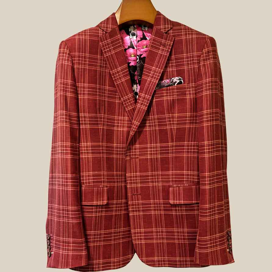 Close-up view of burgundy plaid sport coat showing contrast white accent buttonhole with hand-finished stitching detail