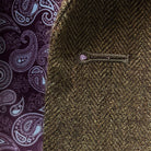 Macro shot of precise buttonhole stitching showing craft detail