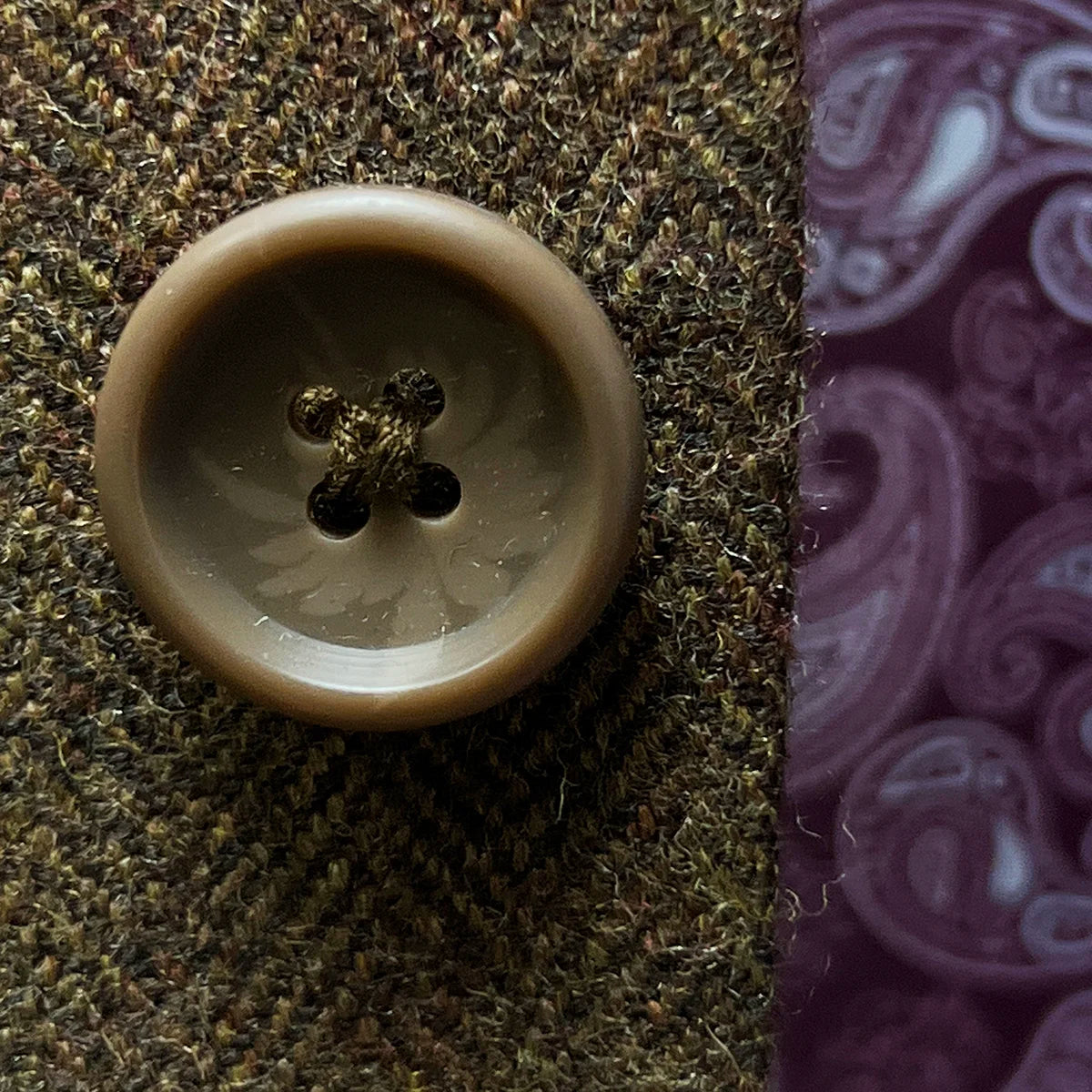 Macro shot of brown horn buttons showing natural marbling and texture