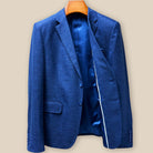 Interior left view showing royal blue silk bemberg lining and inside breast pocket construction