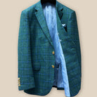 Interior view of dark green Westwood Hart windowpane sport coat, left side, revealing sky blue paisley lining and inner pockets