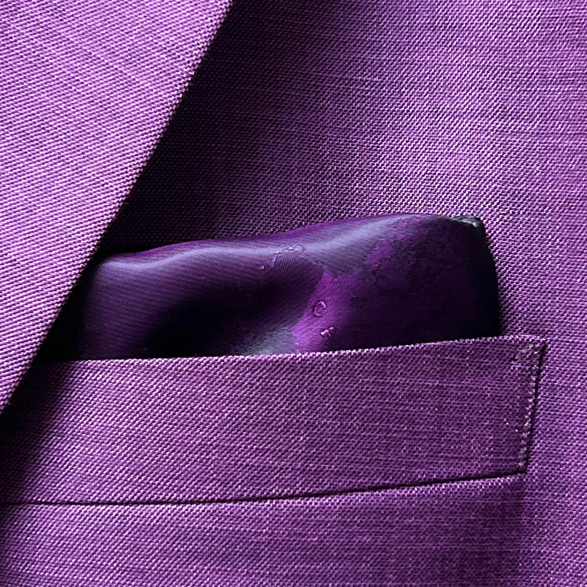 Custom sport coat chest pocket featuring built-in pocket square detail or pocket square styling demonstration