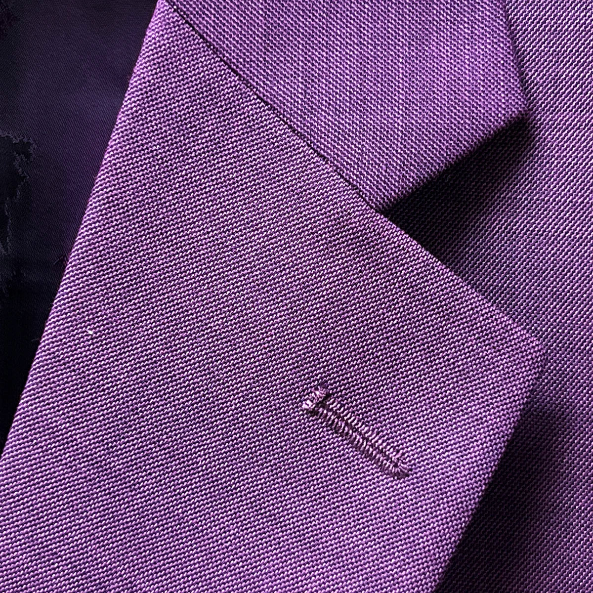Classic notch lapel design on dark orchid purple sport coat showing traditional tailoring and sophisticated lapel construction