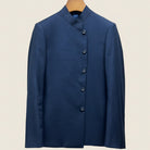 Blue jacket on a beige background