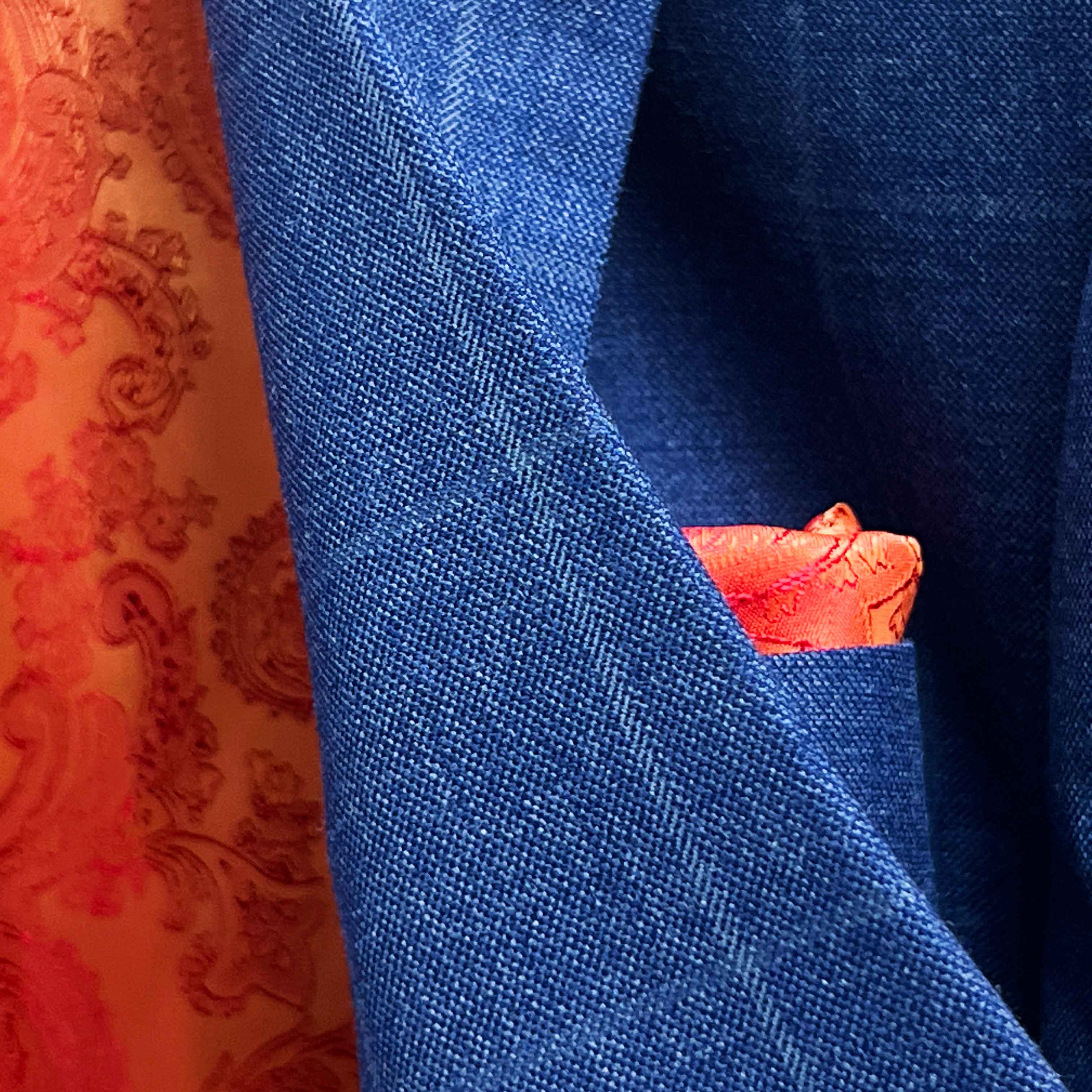 Close-up of deep blue windowpane check fabric texture showing Super 130s Australian merino wool quality and pattern detail