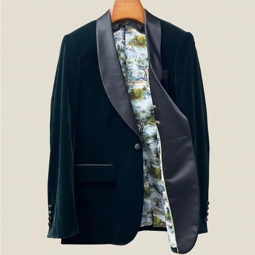 Dark green blazer with a patterned lining on a beige background