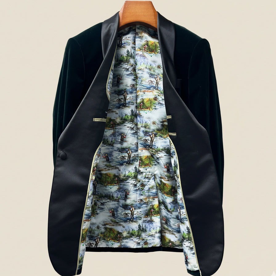 Black blazer with a colorful patterned lining on a beige background