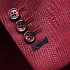 Sport coat jacket sleeve cuff showing functional buttonholes with contrast navy blue accent stitching on deep red basketweave fabric