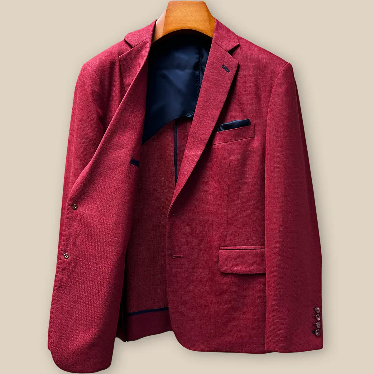 Interior right side of deep red basketweave sport coat jacket revealing navy lining and internal construction details