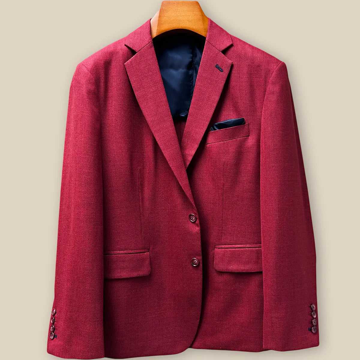 Front button panel of deep red basketweave sport coat jacket featuring dark red horn buttons and hand pick stitching