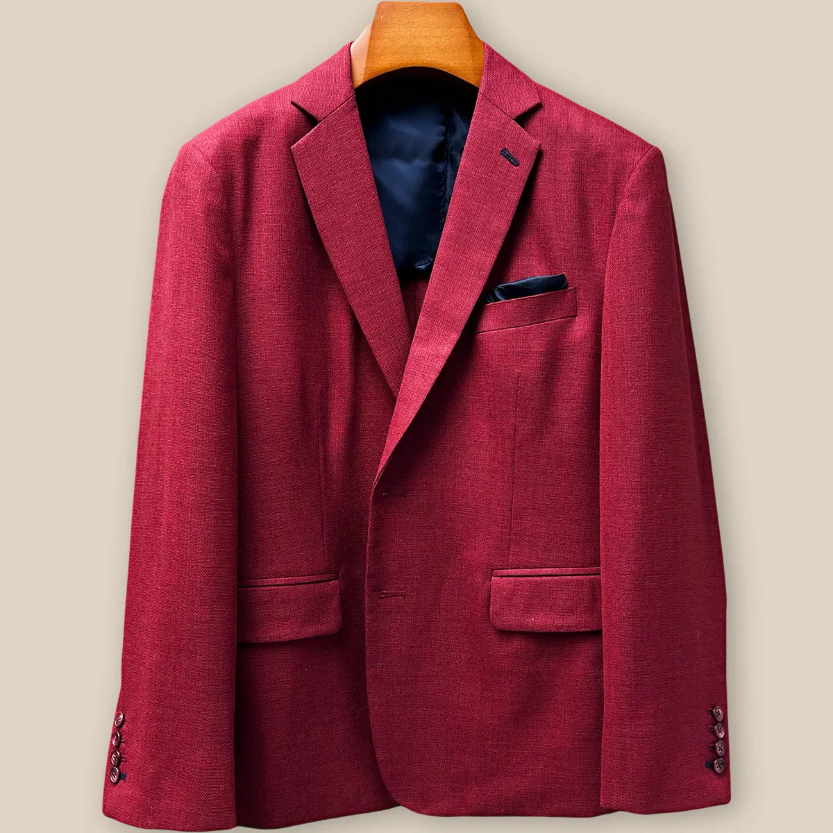 Close-up view of deep red basketweave sport coat jacket showing contrast navy blue accent buttonhole with hand-finished stitching detail