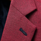 Classic notch lapel detail on deep red basketweave sport coat jacket showing hand pick stitching and basketweave texture