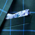 Breast pocket of forest green windowpane sport coat with built-in pocket square holder and hand-finished edges
