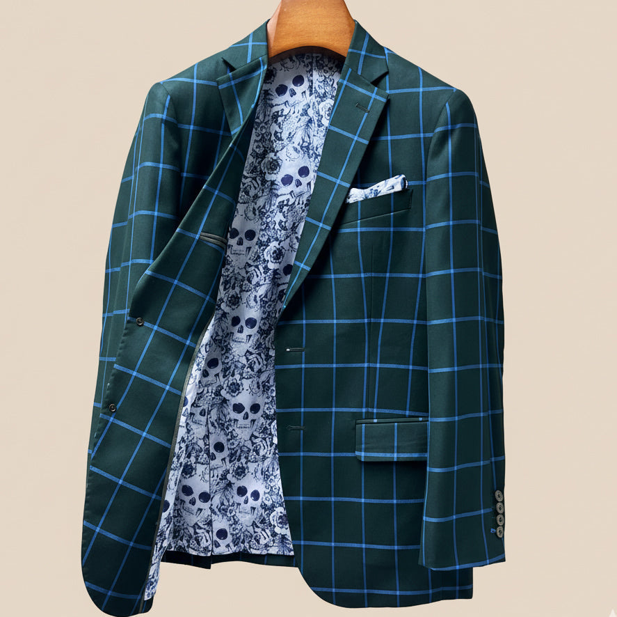 Interior right side of forest green windowpane sport coat revealing floral and skull pattern lining and internal construction details