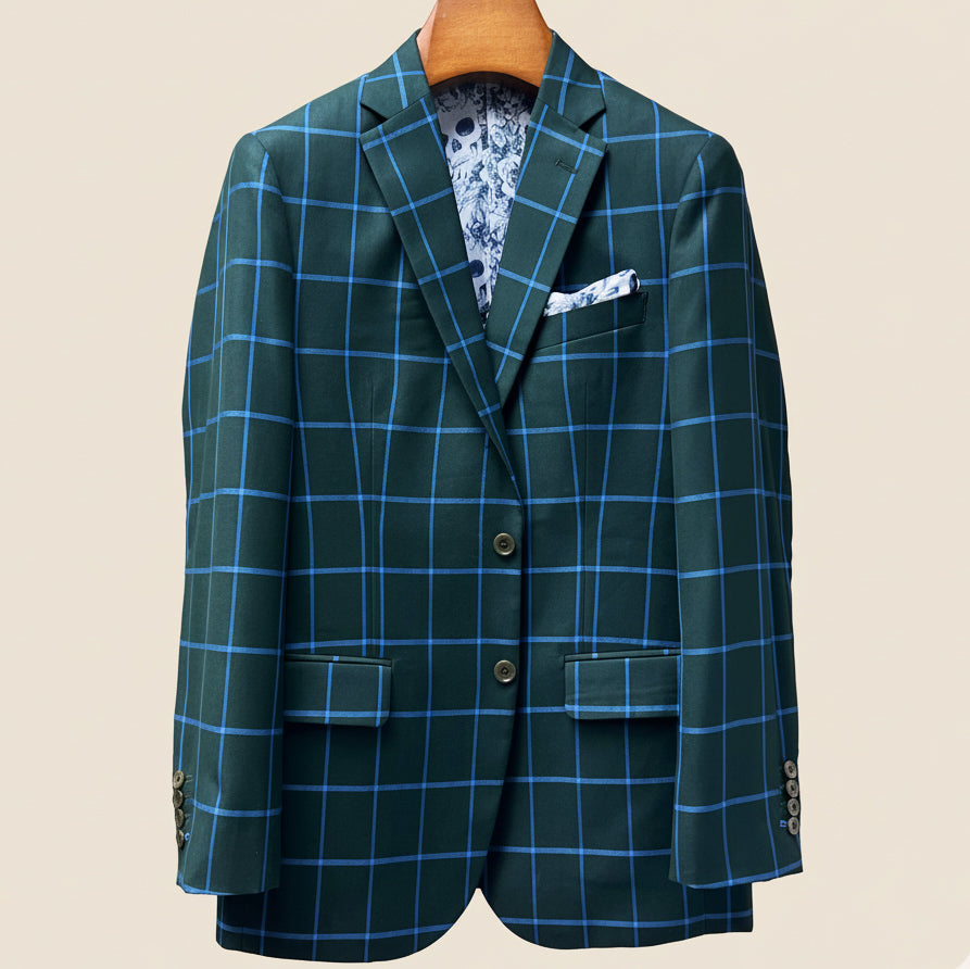 Front button panel of forest green windowpane sport coat featuring green tortoise shell buttons and hand pick stitching