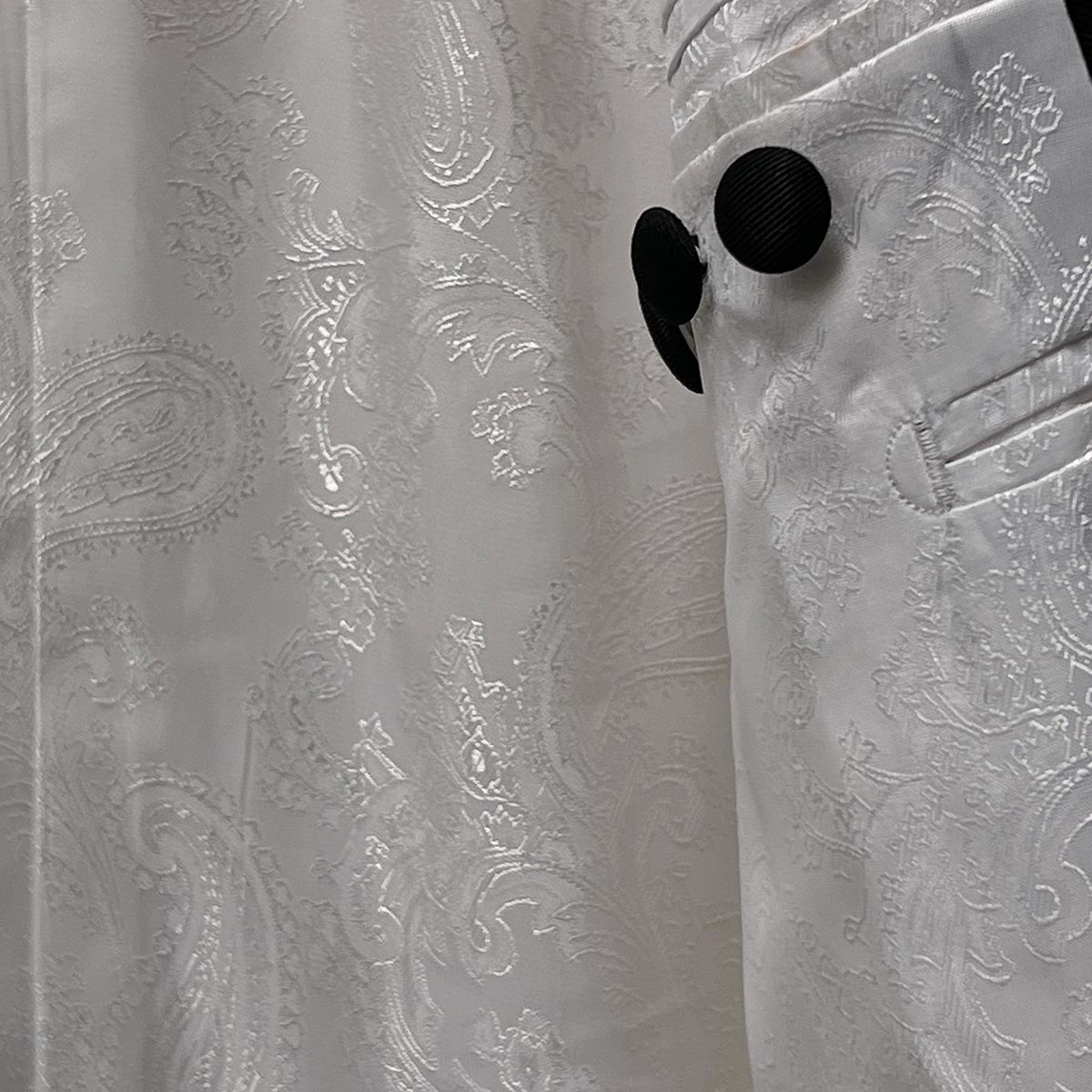 Semi-formal attire by Westwood Hart, tailored in white wool made from 100% Australian Merino with black grosgrain accents.