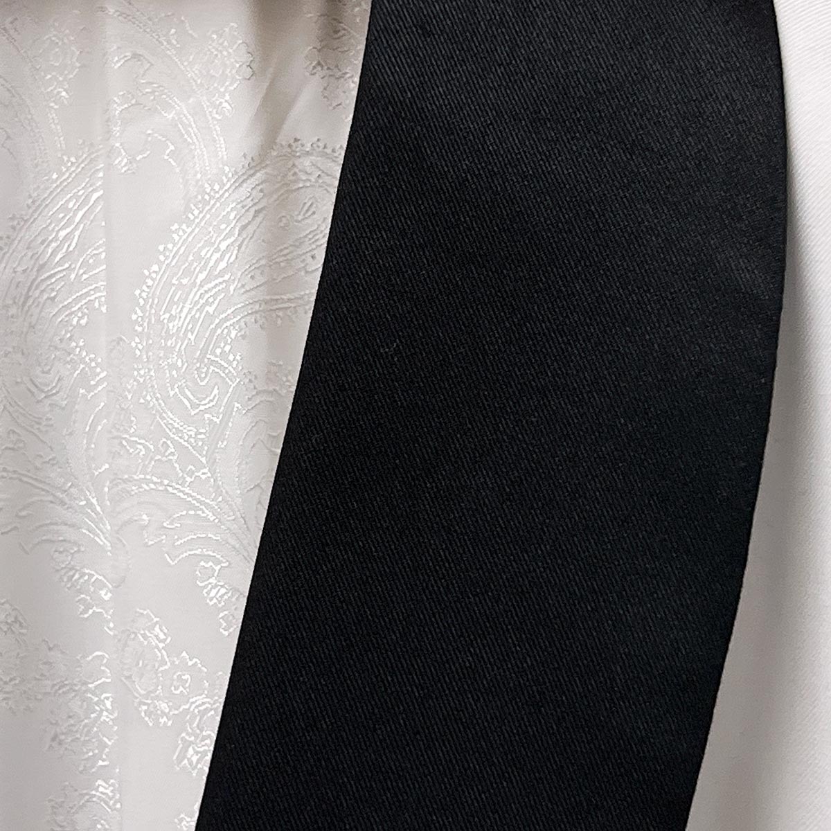 Tuxedo by Westwood Hart, made from 100% Australian Merino wool, complemented by black grosgrain trimming.