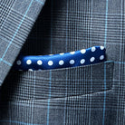 Close-up of breast pocket showing built-in pocket square detail