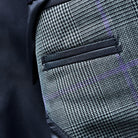 Close-up of smooth grey bemberg lining inside the suit jacket