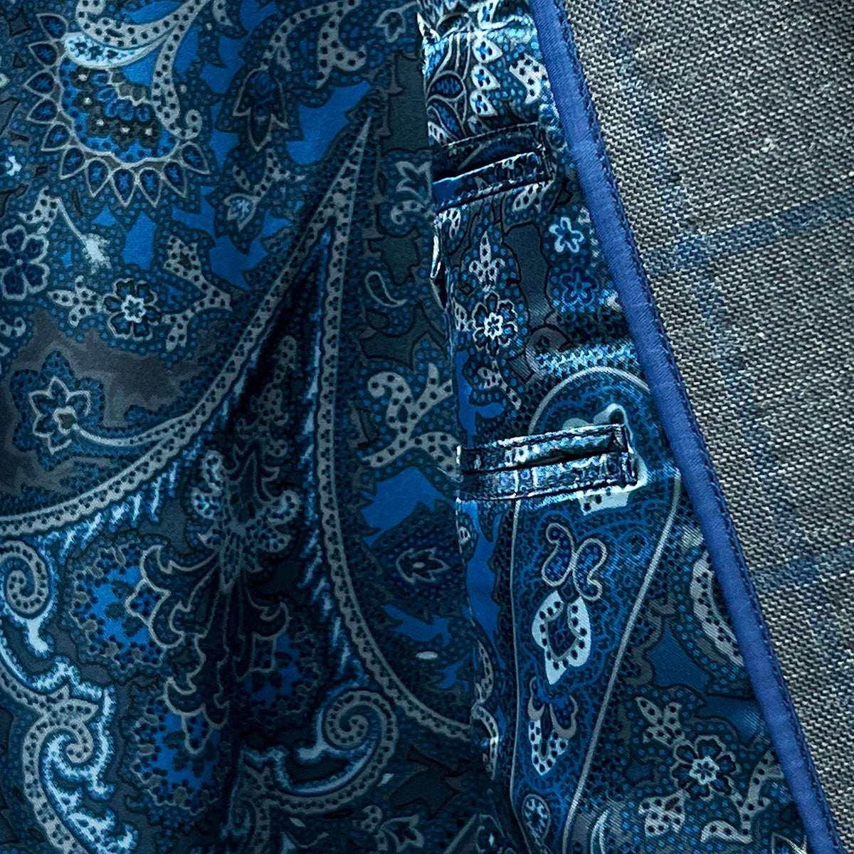 Inside view showcasing the flash linings of the Westwood Hart grey with medium blue windowpane men's sport coat.