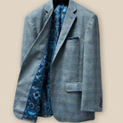 Interior view of the right side of the Westwood Hart grey with medium blue windowpane men's sport coat.