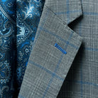Detail of the notch lapel on the Westwood Hart grey with medium blue windowpane men's sport coat.