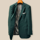 Interior right side of hunter green checkered sport coat jacket revealing paisley lining and internal construction details
