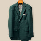 Close-up view of hunter green checkered sport coat jacket showing contrast black accent buttonhole with hand-finished stitching detail