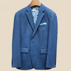 Blue blazer on a beige background
