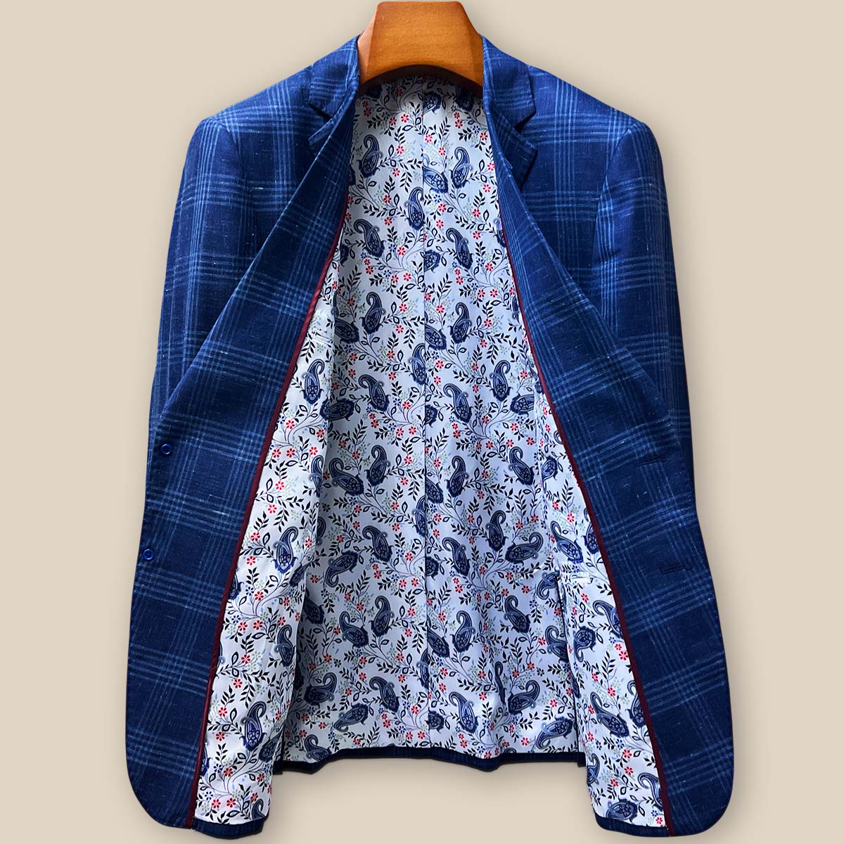 Full interior lining display showing vibrant paisley pattern with intricate medallion designs complementing the indigo blue exterior fabric