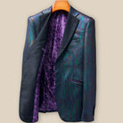 Interior right side of iridescent teal green purple black tuxedo jacket revealing purple paisley lining and internal construction details