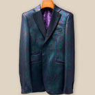 Close-up view of iridescent teal green purple black tuxedo jacket showing contrast buttonhole with hand-finished stitching detail