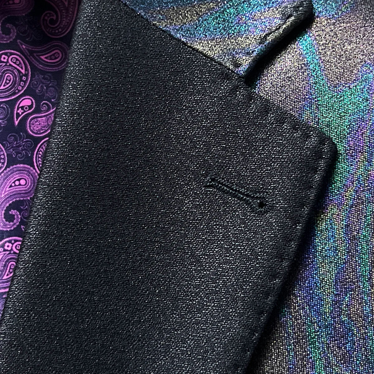 Classic notch lapel detail on iridescent teal green purple black tuxedo jacket showing hand pick stitching and colour-shifting fabric